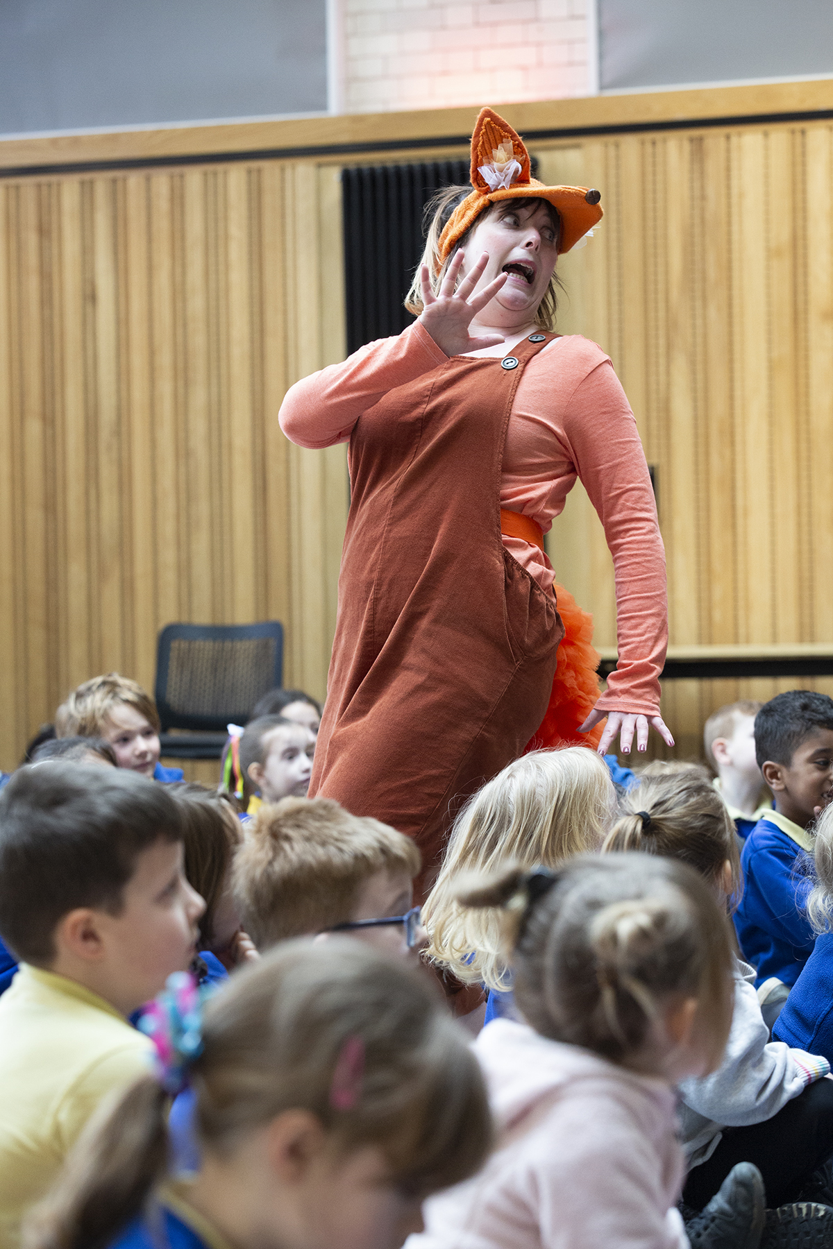 Soprano Marie Claire Breen performs Opera North's Mini Vixen for children from Hotspur Primary School
